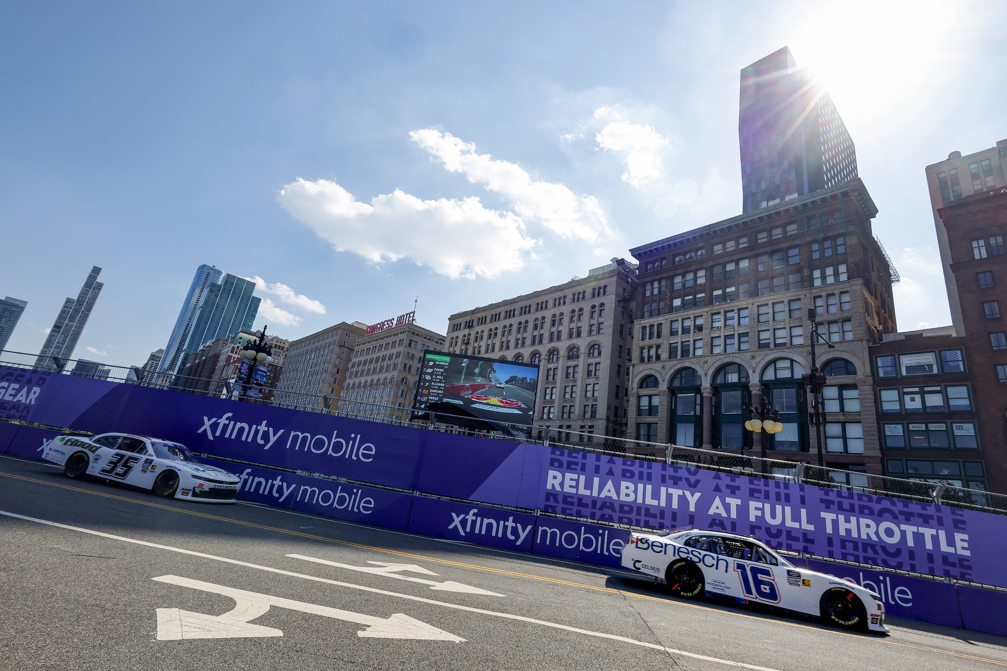 CHICAGO, ILLINOIS - JULY 05: Christian Eckes, driver of the #16 Benesch Law Chevrolet, and Andre Castro, driver of the #35 TBD Chevrolet, race during the NASCAR Xfinity Series The Loop 110 at Chicago Street Course on July 05, 2025 in Chicago, Illinois. (Photo by Logan Riely/Getty Images) | Getty Images