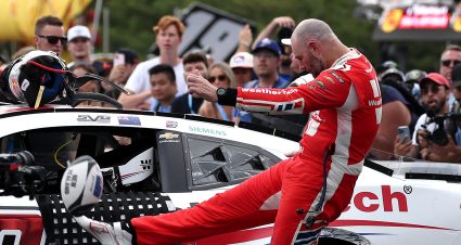 CHICAGO, ILLINOIS - JULY 06: Shane Van Gisbergen, driver of the #88 WeatherTech Chevrolet, kicks a rugby ball after winning the NASCAR Cup Series Grant Park 165 at Chicago Street Course on July 06, 2025 in Chicago, Illinois. (Photo by James Gilbert/Getty Images) | Getty Images