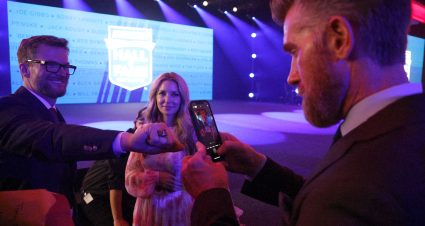 CHARLOTTE, NORTH CAROLINA - JANUARY 21: NASCAR Hall of Fame inductee Dale Earnhardt Jr. displays his NASCAR Hall of Fame ring for ESPN reporter, Marty Smith to take a photo during the 2021 NASCAR Hall of Fame Induction Ceremony at NASCAR Hall of Fame on January 21, 2022 in Charlotte, North Carolina. (Photo by Chris Graythen/Getty Images) | Getty Images