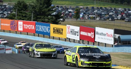 WATKINS GLEN, NEW YORK - AUGUST 10: Ryan Blaney, driver of the #12 Menards/Richmond Water Heaters Ford, and William Byron, driver of the #24 Raptor Chevrolet, race during the NASCAR Cup Series Go Bowling at The Glen at Watkins Glen International on August 10, 2025 in Watkins Glen, New York. (Photo by Chris Graythen/Getty Images) | Getty Images
