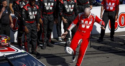 WATKINS GLEN, NEW YORK - AUGUST 10: Shane Van Gisbergen, driver of the #88 WeatherTech Chevrolet, kicks a rugby ball in celebration after winning the NASCAR Cup Series Go Bowling at The Glen at Watkins Glen International on August 10, 2025 in Watkins Glen, New York. (Photo by Sean Gardner/Getty Images) | Getty Images
