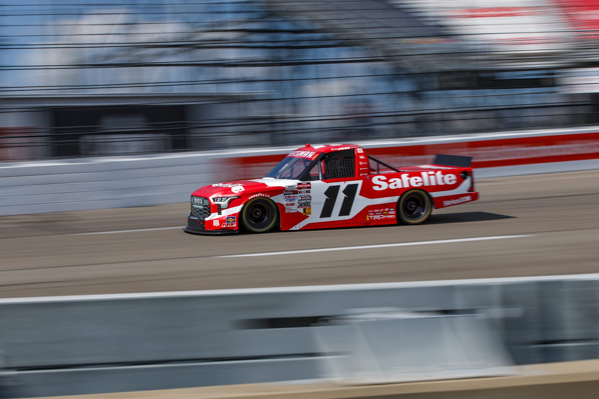 RICHMOND, VIRGINIA - AUGUST 15: Corey Heim, driver of the #11 Safelite Toyota, drives during qualifying for the NASCAR Craftsman Truck Series eero 250 at Richmond Raceway on August 15, 2025 in Richmond, Virginia. (Photo by Samuel Corum/Getty Images) | Getty Images