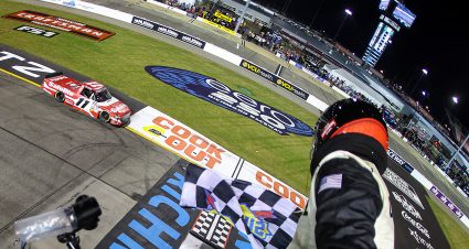 RICHMOND, VIRGINIA - AUGUST 15: Corey Heim, driver of the #11 Safelite Toyota, takes the checkered flag to win the NASCAR Craftsman Truck Series eero 250 at Richmond Raceway on August 15, 2025 in Richmond, Virginia. (Photo by Chris Graythen/Getty Images) | Getty Images