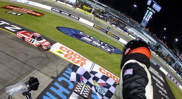 RICHMOND, VIRGINIA - AUGUST 15: Corey Heim, driver of the #11 Safelite Toyota, takes the checkered flag to win the NASCAR Craftsman Truck Series eero 250 at Richmond Raceway on August 15, 2025 in Richmond, Virginia. (Photo by Chris Graythen/Getty Images) | Getty Images