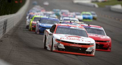 LONG POND, PENNSYLVANIA - JUNE 21: Connor Zilisch, driver of the #88 Registix Chevrolet, leads the field during the NASCAR Xfinity Series Explore the Pocono Mountains 250 at Pocono Raceway on June 21, 2025 in Long Pond, Pennsylvania. (Photo by Jonathan Bachman/Getty Images) | Getty Images
