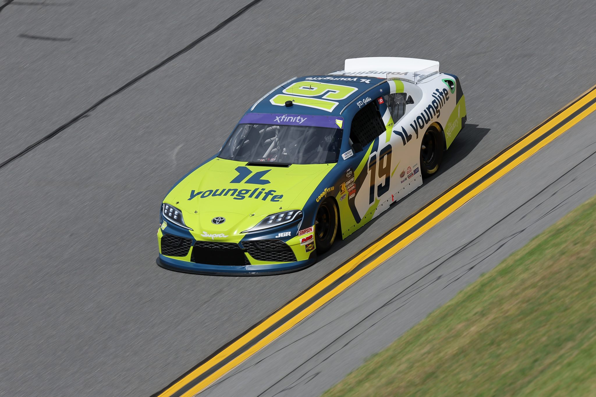 DAYTONA BEACH, FLORIDA - AUGUST 22: Aric Almirola, driver of the #19 Young Life Toyota, drives during qualifying for the NASCAR Xfinity Series Wawa 250 Powered By Coca-Cola at Daytona International Speedway on August 22, 2025 in Daytona Beach, Florida. (Photo by Jonathan Bachman/Getty Images) | Getty Images