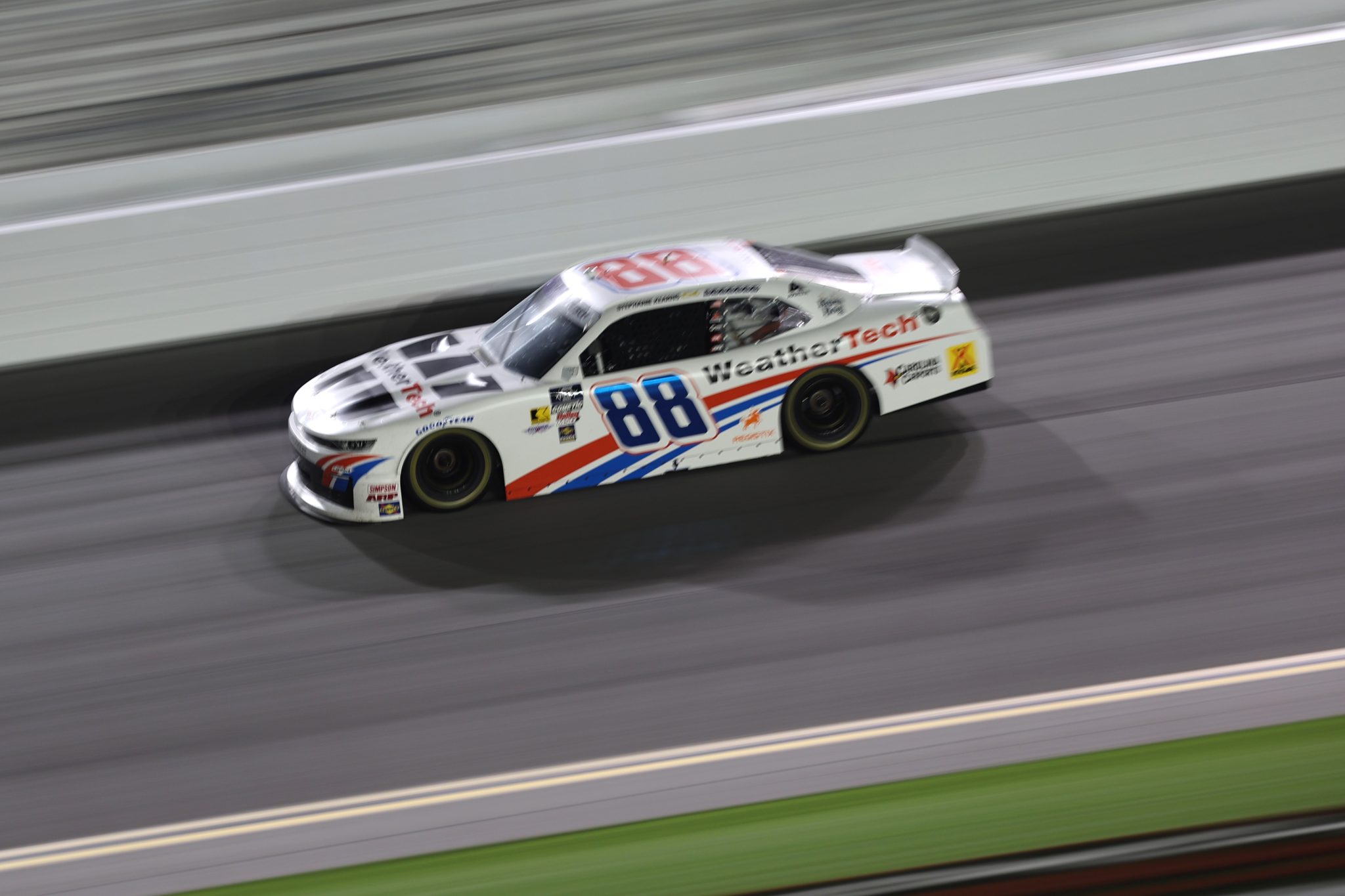 DAYTONA BEACH, FLORIDA - AUGUST 22: Parker Kligerman, driver of the #88 WeatherTech Chevrolet, races during the NASCAR Xfinity Series Wawa 250 Powered By Coca-Cola at Daytona International Speedway on August 22, 2025 in Daytona Beach, Florida. (Photo by James Gilbert/Getty Images) | Getty Images