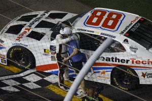 DAYTONA BEACH, FLORIDA - AUGUST 22: Connor Zilisch congratulates Parker Kligerman, driver of the #88 WeatherTech Chevrolet, after winning the NASCAR Xfinity Series Wawa 250 Powered By Coca-Cola at Daytona International Speedway on August 22, 2025 in Daytona Beach, Florida. (Photo by Sean Gardner/Getty Images) | Getty Images