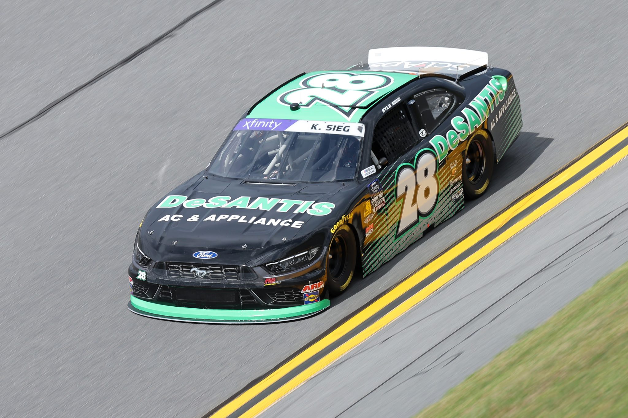 DAYTONA BEACH, FLORIDA - AUGUST 22: Kyle Sieg, driver of the #28 DeSantis AC & Appliance Ford, drives during qualifying for the NASCAR Xfinity Series Wawa 250 Powered By Coca-Cola at Daytona International Speedway on August 22, 2025 in Daytona Beach, Florida. (Photo by Jonathan Bachman/Getty Images) | Getty Images