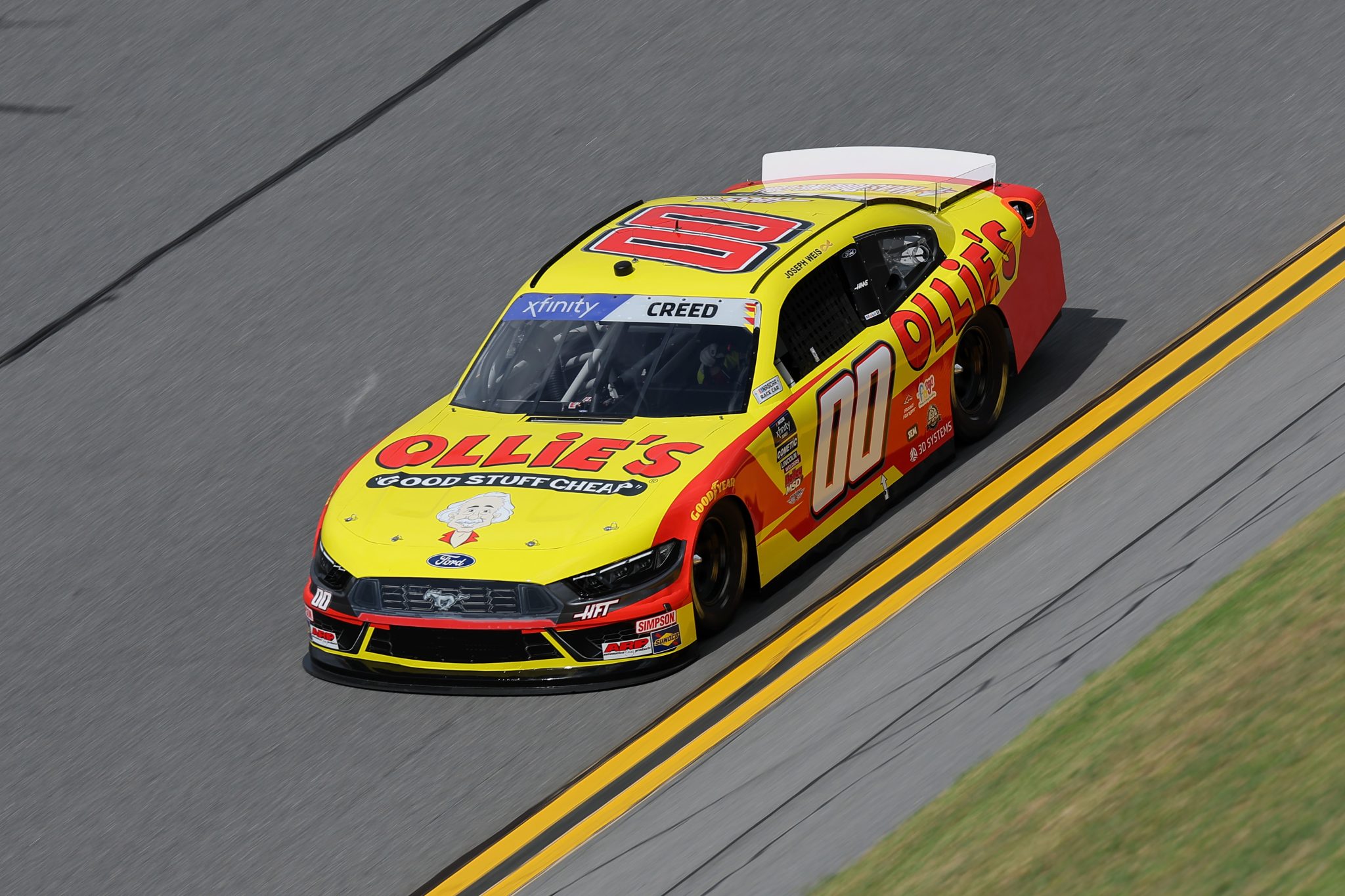DAYTONA BEACH, FLORIDA - AUGUST 22: Sheldon Creed, driver of the #00 Ollie's Ford, drives during qualifying for the NASCAR Xfinity Series Wawa 250 Powered By Coca-Cola at Daytona International Speedway on August 22, 2025 in Daytona Beach, Florida. (Photo by Jonathan Bachman/Getty Images) | Getty Images