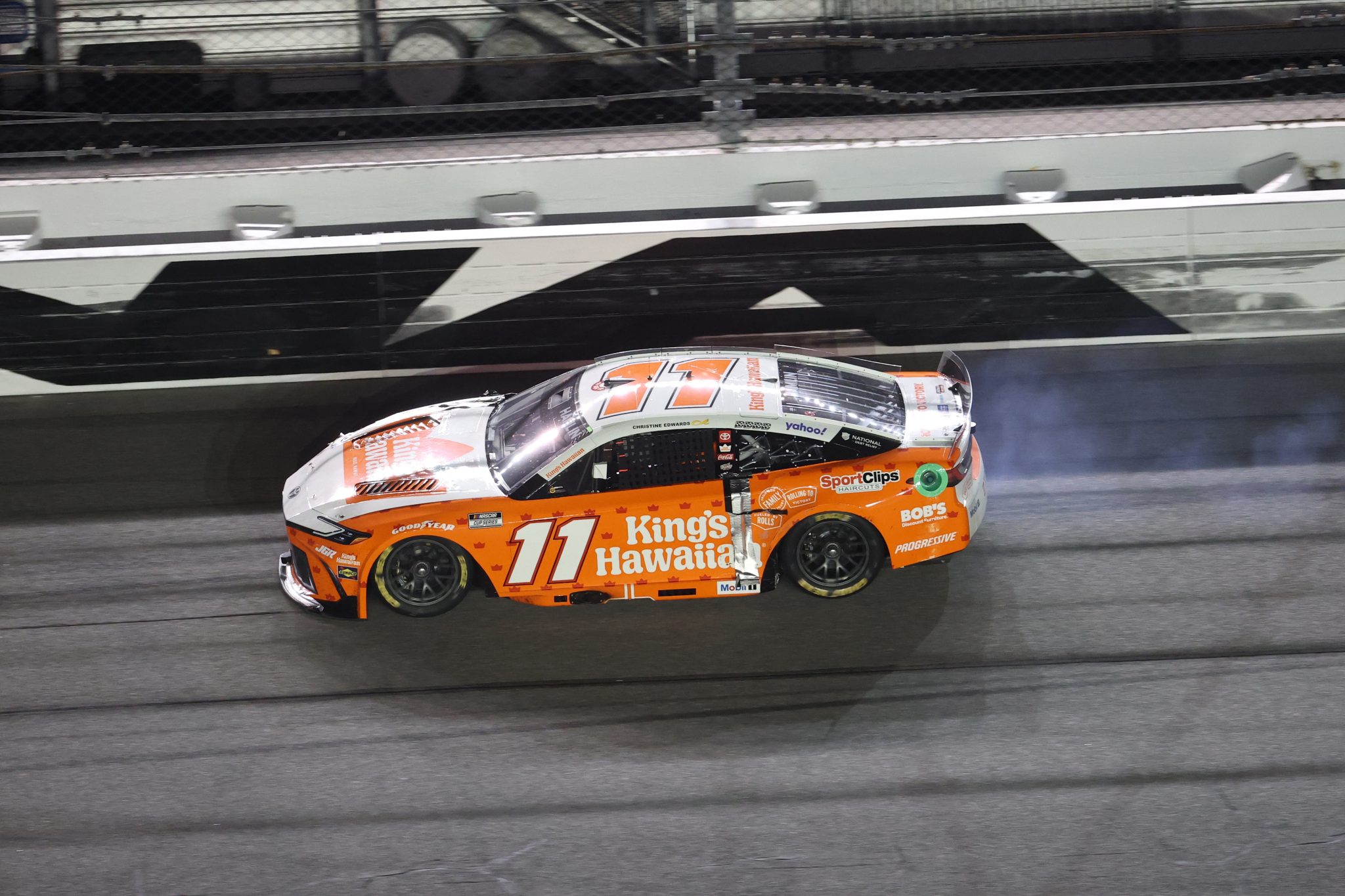 DAYTONA BEACH, FLORIDA - AUGUST 23: Denny Hamlin, driver of the #11 King's Hawaiian Toyota, drives slow around the track after suffering damage during the NASCAR Cup Series Coke Zero Sugar 400 at Daytona International Speedway on August 23, 2025 in Daytona Beach, Florida. (Photo by Chris Graythen/Getty Images) | Getty Images