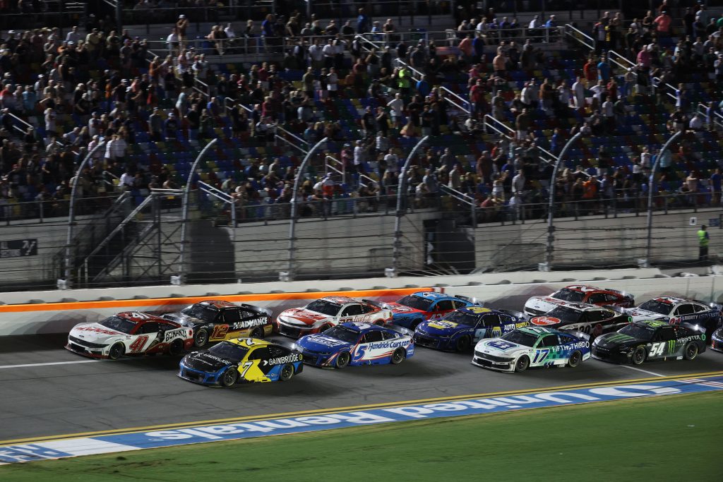 DAYTONA BEACH, FLORIDA - AUGUST 23: Cole Custer, driver of the #41 Haas/Bonanza Ford, races Justin Haley, driver of the #7 Gainbridge Chevrolet, during the NASCAR Cup Series Coke Zero Sugar 400 at Daytona International Speedway on August 23, 2025 in Daytona Beach, Florida. (Photo by Chris Graythen/Getty Images) | Getty Images