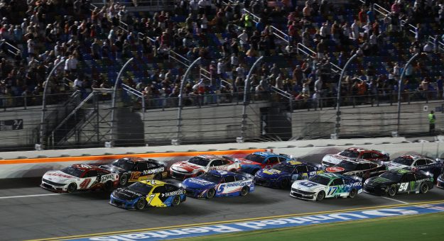 DAYTONA BEACH, FLORIDA - AUGUST 23: Cole Custer, driver of the #41 Haas/Bonanza Ford, races Justin Haley, driver of the #7 Gainbridge Chevrolet, during the NASCAR Cup Series Coke Zero Sugar 400 at Daytona International Speedway on August 23, 2025 in Daytona Beach, Florida. (Photo by Chris Graythen/Getty Images) | Getty Images
