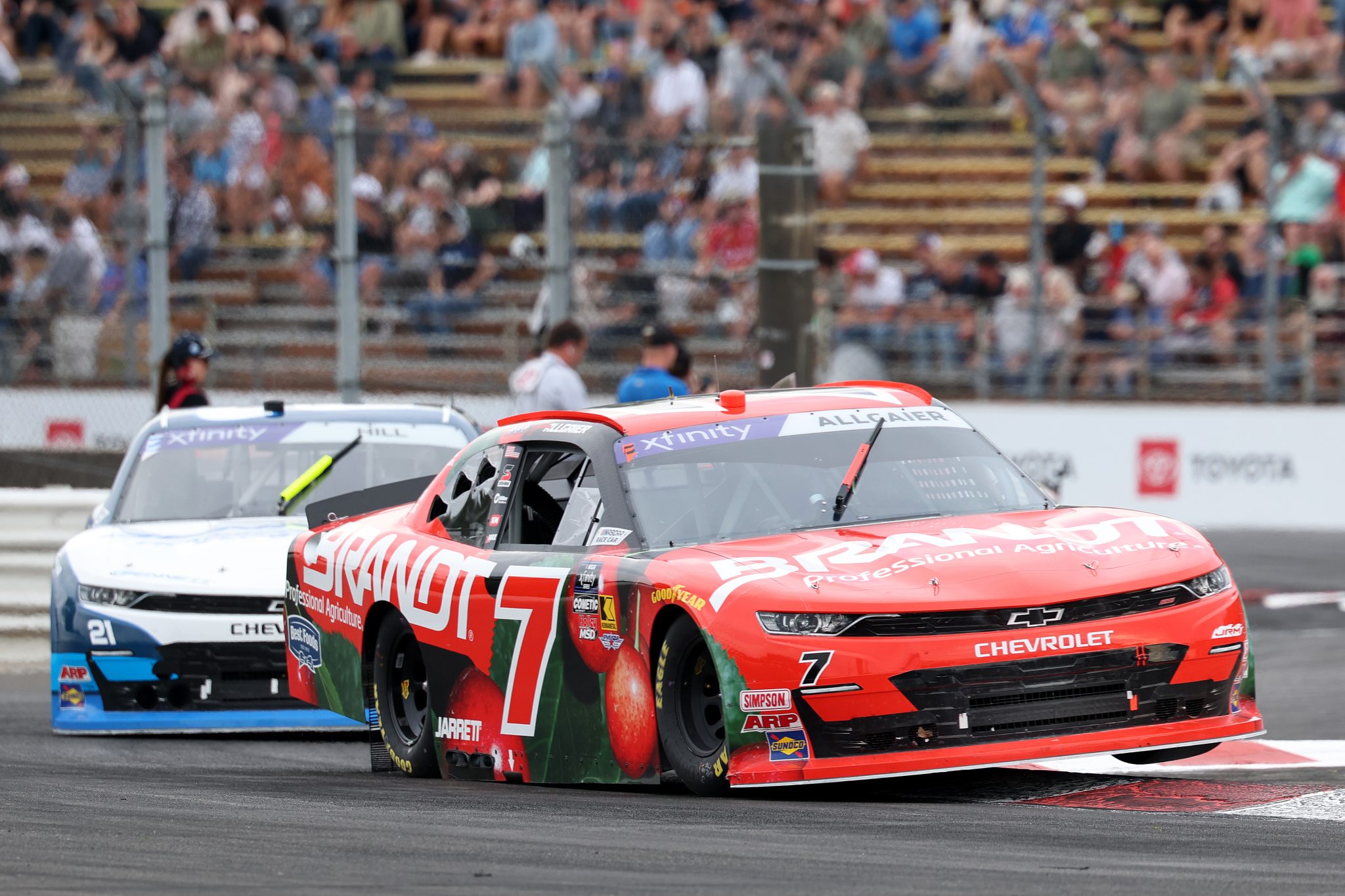 PORTLAND, OREGON - AUGUST 30: Justin Allgaier, driver of the #7 BRANDT Chevrolet, and Austin Hill, driver of the #21 Bennett Transportation Chevrolet, race during the NASCAR Xfinity Series Pacific Office Automation 147 at Portland International Raceway on August 30, 2025 in Portland, Oregon. (Photo by David Jensen/Getty Images) | Getty Images