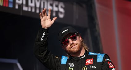 DARLINGTON, SOUTH CAROLINA - AUGUST 31: Tyler Reddick, driver of the #45 Pinnacle Toyota, waves to fans as he walks onstage during driver intros prior to the NASCAR Cup Series Cook Out Southern 500 at Darlington Raceway on August 31, 2025 in Darlington, South Carolina. (Photo by Jared C. Tilton/Getty Images) | Getty Images
