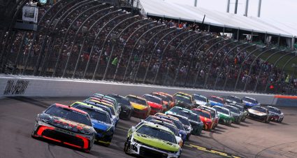 NEWTON, IOWA - AUGUST 03: Chase Briscoe, driver of the #19 Bass Pro Shops Toyota, and William Byron, driver of the #24 Raptor Chevrolet, lead the field to start the NASCAR Cup Series Iowa Corn 350 Powered by Ethanol at Iowa Speedway on August 03, 2025 in Newton, Iowa. (Photo by Meg Oliphant/Getty Images) | Getty Images