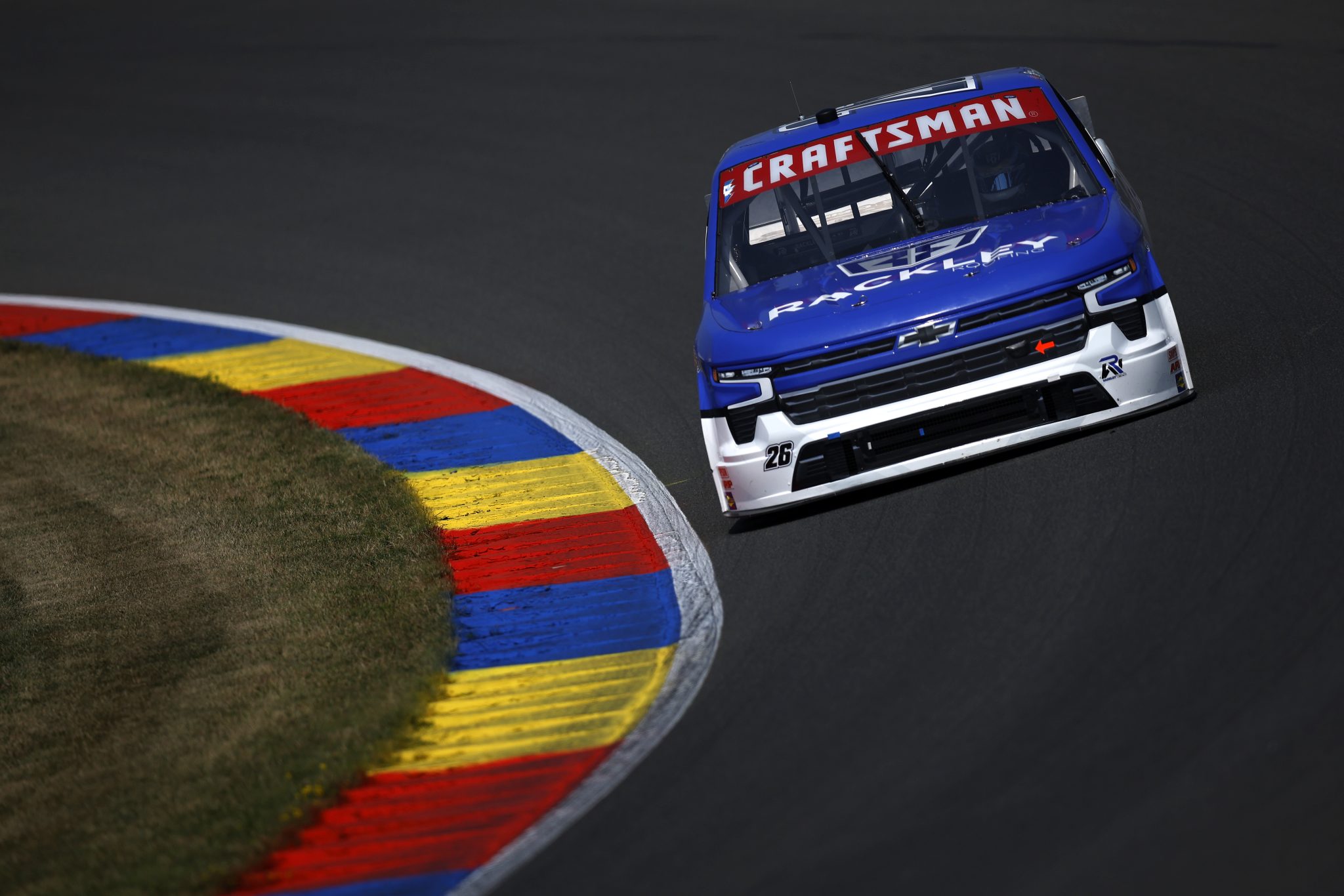 WATKINS GLEN, NEW YORK - AUGUST 08: Dawson Sutton, driver of the #26 Rackley Roofing Chevrolet, drives during practice for the NASCAR Craftsman Truck Series Mission 176 at The Glen at Watkins Glen International on August 08, 2025 in Watkins Glen, New York. (Photo by Sean Gardner/Getty Images) | Getty Images