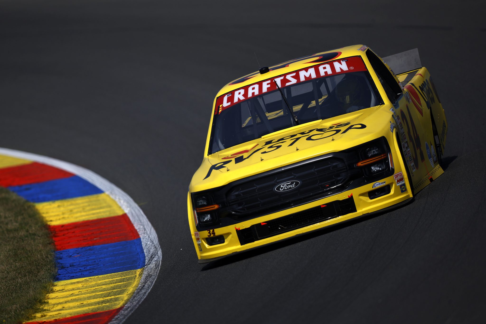 WATKINS GLEN, NEW YORK - AUGUST 08: Layne Riggs, driver of the #34 Love's RV STOP Ford, drives during practice for the NASCAR Craftsman Truck Series Mission 176 at The Glen at Watkins Glen International on August 08, 2025 in Watkins Glen, New York. (Photo by Sean Gardner/Getty Images) | Getty Images