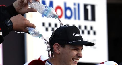 WATKINS GLEN, NEW YORK - AUGUST 08: Corey Heim, driver of the #11 Mobil 1 Toyota, is doused with water in victory lane after winning  the NASCAR Craftsman Truck Series Mission 176 at The Glen at Watkins Glen International on August 08, 2025 in Watkins Glen, New York. (Photo by Sean Gardner/Getty Images) | Getty Images