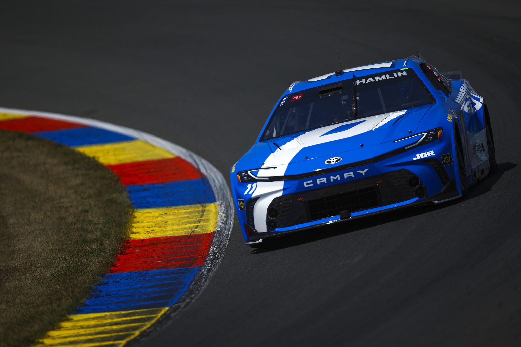 WATKINS GLEN, NEW YORK - AUGUST 09: Denny Hamlin, driver of the #11 Progressive Toyota, drives during practice for the NASCAR Cup Series Go Bowling at The Glen at Watkins Glen International on August 09, 2025 in Watkins Glen, New York. (Photo by Sean Gardner/Getty Images) | Getty Images