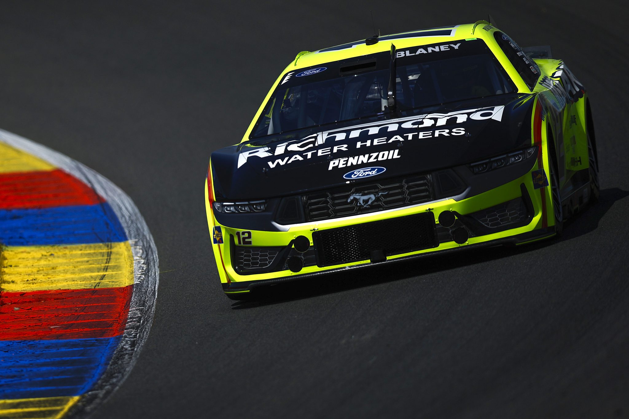 WATKINS GLEN, NEW YORK - AUGUST 09: Ryan Blaney, driver of the #12 Menards/Richmond Water Heaters Ford, drives during practice for the NASCAR Cup Series Go Bowling at The Glen at Watkins Glen International on August 09, 2025 in Watkins Glen, New York. (Photo by Sean Gardner/Getty Images) | Getty Images