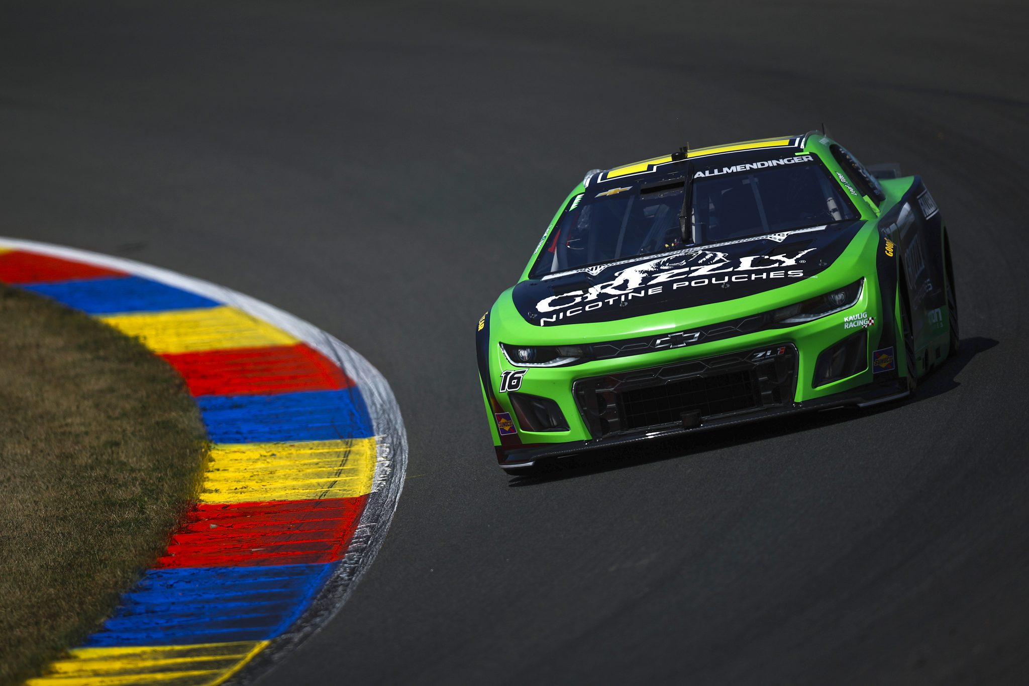 WATKINS GLEN, NEW YORK - AUGUST 09: AJ Allmendinger, driver of the #16 Grizzly Nicotine Pouches Chevrolet, drives during practice for the NASCAR Cup Series Go Bowling at The Glen at Watkins Glen International on August 09, 2025 in Watkins Glen, New York. (Photo by Sean Gardner/Getty Images) | Getty Images