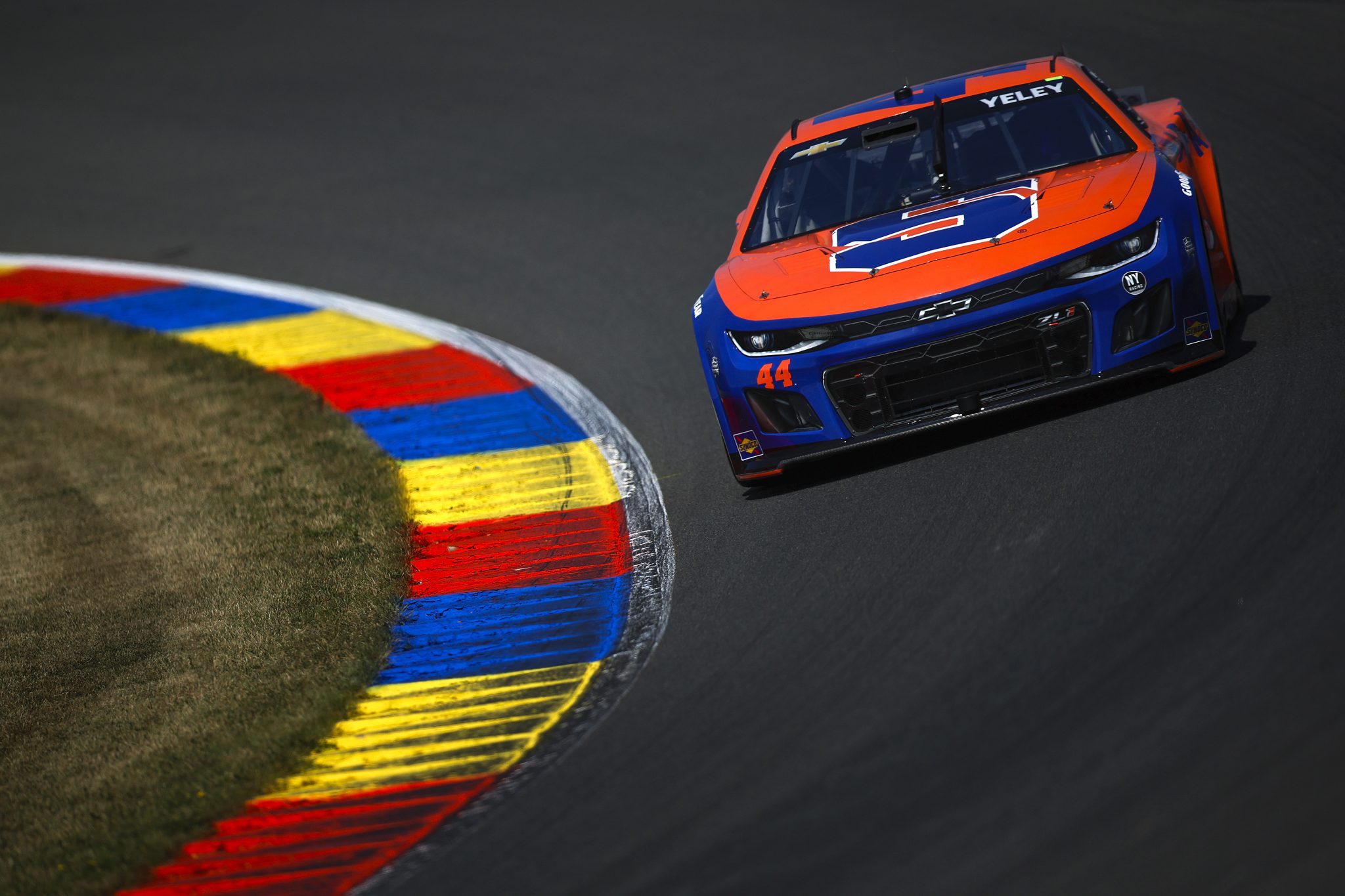 WATKINS GLEN, NEW YORK - AUGUST 09: JJ Yeley, driver of the #44 Syracuse Football NIL Chevrolet, drives during practice for the NASCAR Cup Series Go Bowling at The Glen at Watkins Glen International on August 09, 2025 in Watkins Glen, New York. (Photo by Sean Gardner/Getty Images) | Getty Images