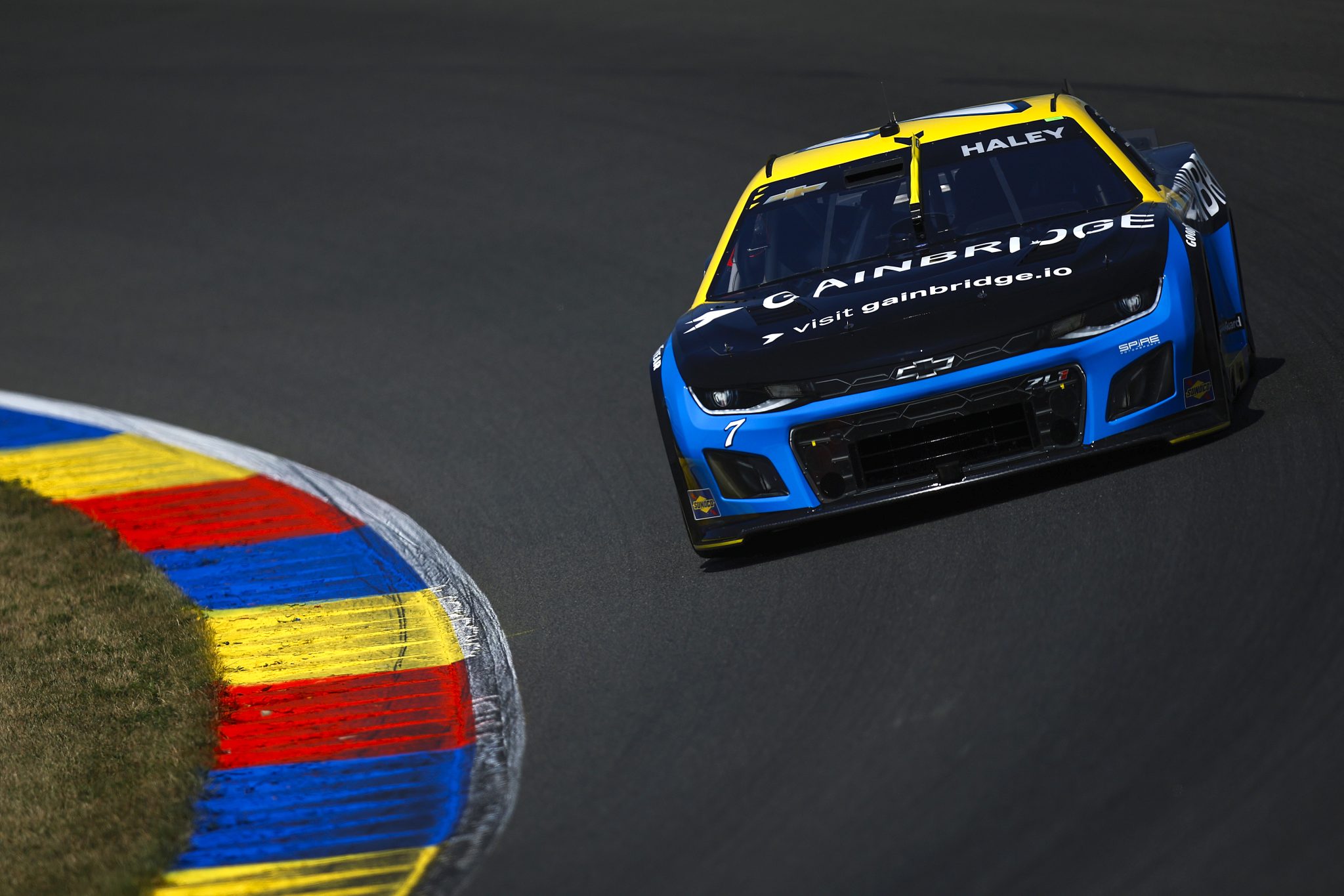 WATKINS GLEN, NEW YORK - AUGUST 09: Justin Haley, driver of the #7 Gainbridge Chevrolet, drives during practice for the NASCAR Cup Series Go Bowling at The Glen at Watkins Glen International on August 09, 2025 in Watkins Glen, New York. (Photo by Sean Gardner/Getty Images) | Getty Images
