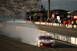 WATKINS GLEN, NEW YORK - AUGUST 09: Connor Zilisch, driver of the #88 Registix Chevrolet, celebrates with a burnout after winning the NASCAR Xfinity Series Mission 200 at The Glen at Watkins Glen International on August 09, 2025 in Watkins Glen, New York. (Photo by Sean Gardner/Getty Images) | Getty Images