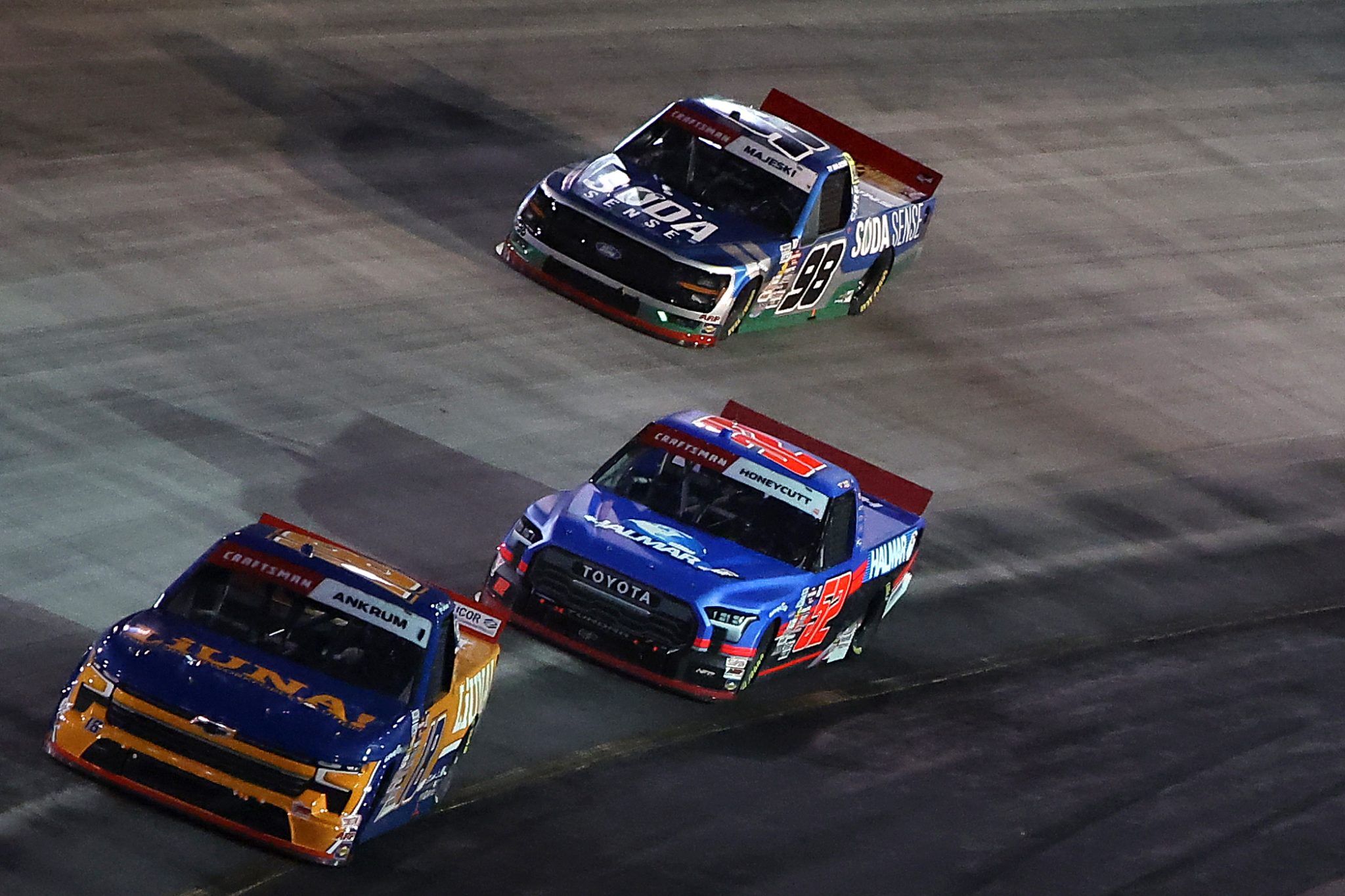 BRISTOL, TENNESSEE - SEPTEMBER 11: Daniel Hemric, driver of the #19 South Point Hotel & Casino Chevrolet, Kaden Honeycutt, driver of the #52 Halmar International Toyota, and Ty Majeski, driver of the #98 Soda Sense/Curb Records Ford, race during the NASCAR Craftsman Truck Series UNOH 200 presented by Ohio Logistics at Bristol Motor Speedway on September 11, 2025 in Bristol, Tennessee. (Photo by Jonathan Bachman/Getty Images) | Getty Images