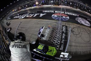 BRISTOL, TENNESSEE - SEPTEMBER 12: Aric Almirola, driver of the #19 Young Life Toyota, takes the checkered flag to win the NASCAR Xfinity Series Food City 300 at Bristol Motor Speedway on September 12, 2025 in Bristol, Tennessee. (Photo by Jonathan Bachman/Getty Images) | Getty Images