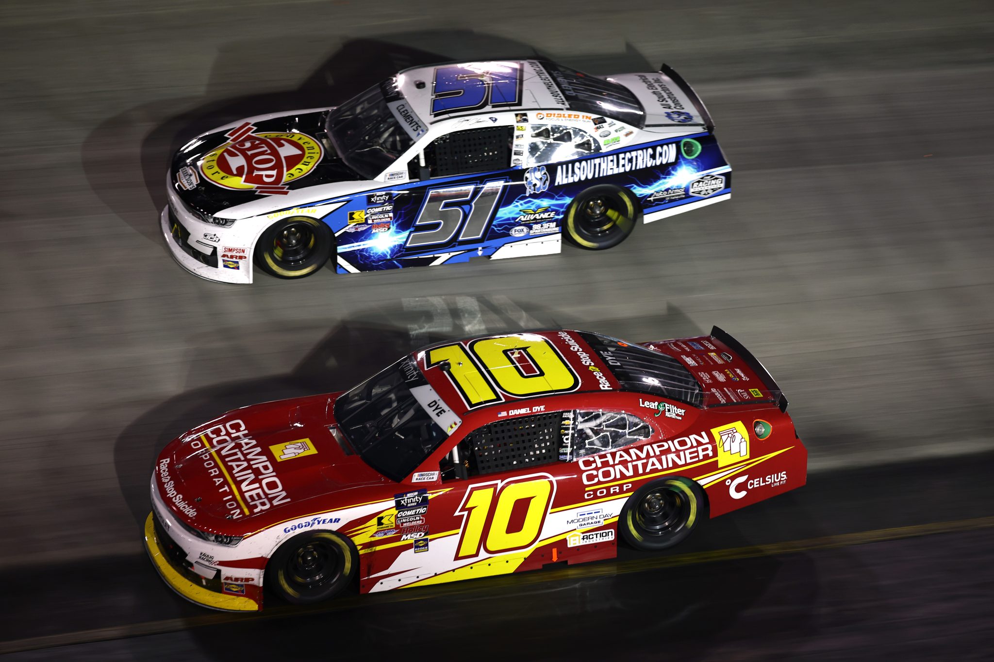 BRISTOL, TENNESSEE - SEPTEMBER 12: Jeremy Clements, driver of the #51 All South Electric Chevrolet, and Daniel Dye, driver of the #10 Champion Container Chevrolet, race during the NASCAR Xfinity Series Food City 300 at Bristol Motor Speedway on September 12, 2025 in Bristol, Tennessee. (Photo by Jared C. Tilton/Getty Images) | Getty Images