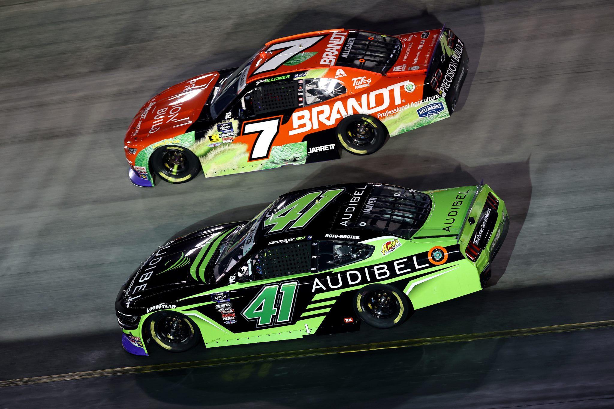 BRISTOL, TENNESSEE - SEPTEMBER 12: Sam Mayer, driver of the #41 Audibel Ford, and Justin Allgaier, driver of the #7 BRANDT/Precision Build Chevrolet, race during the NASCAR Xfinity Series Food City 300 at Bristol Motor Speedway on September 12, 2025 in Bristol, Tennessee. (Photo by Jared C. Tilton/Getty Images) | Getty Images