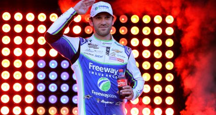 BRISTOL, TENNESSEE - SEPTEMBER 13: Daniel Suarez, driver of the #99 Freeway Insurance Chevrolet, waves to fans as he walks onstage during driver intros prior to the NASCAR Cup Series Bass Pro Shops Night Race at Bristol Motor Speedway on September 13, 2025 in Bristol, Tennessee. (Photo by Jonathan Bachman/Getty Images) | Getty Images