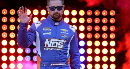BRISTOL, TENNESSEE - SEPTEMBER 13: Ricky Stenhouse Jr., driver of the #47 NOS Energy Chevrolet, waves to fans as he walks onstage during driver intros prior to the NASCAR Cup Series Bass Pro Shops Night Race at Bristol Motor Speedway on September 13, 2025 in Bristol, Tennessee. (Photo by Jonathan Bachman/Getty Images) | Getty Images