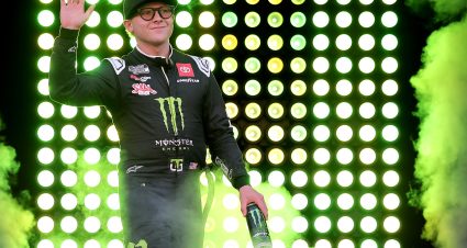 BRISTOL, TENNESSEE - SEPTEMBER 13: Ty Gibbs, driver of the #54 Monster Energy Toyota, waves to fans as he walks onstage during driver intros prior to the NASCAR Cup Series Bass Pro Shops Night Race at Bristol Motor Speedway on September 13, 2025 in Bristol, Tennessee. (Photo by Jonathan Bachman/Getty Images) | Getty Images