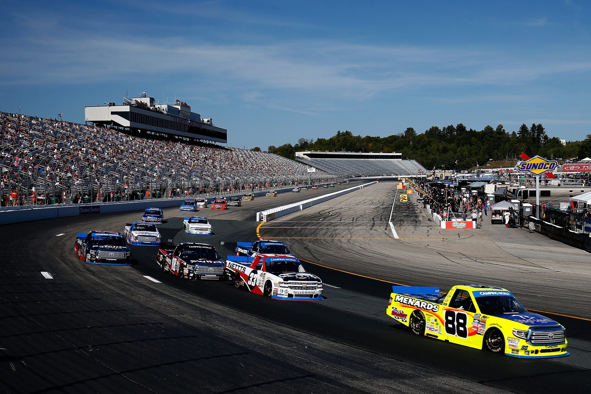 LOUDON, NH - SEPTEMBER 23: Matt Crafton, driver of the #88 Great Lakes Floors/Menards Toyota, leads a pack of trucks during the NASCAR Camping World Truck Series UNOH 175 at New Hampshire Motor Speedway on September 23, 2017 in Loudon, New Hampshire. (Photo by Jeff Zelevansky/Getty Images) | Getty Images