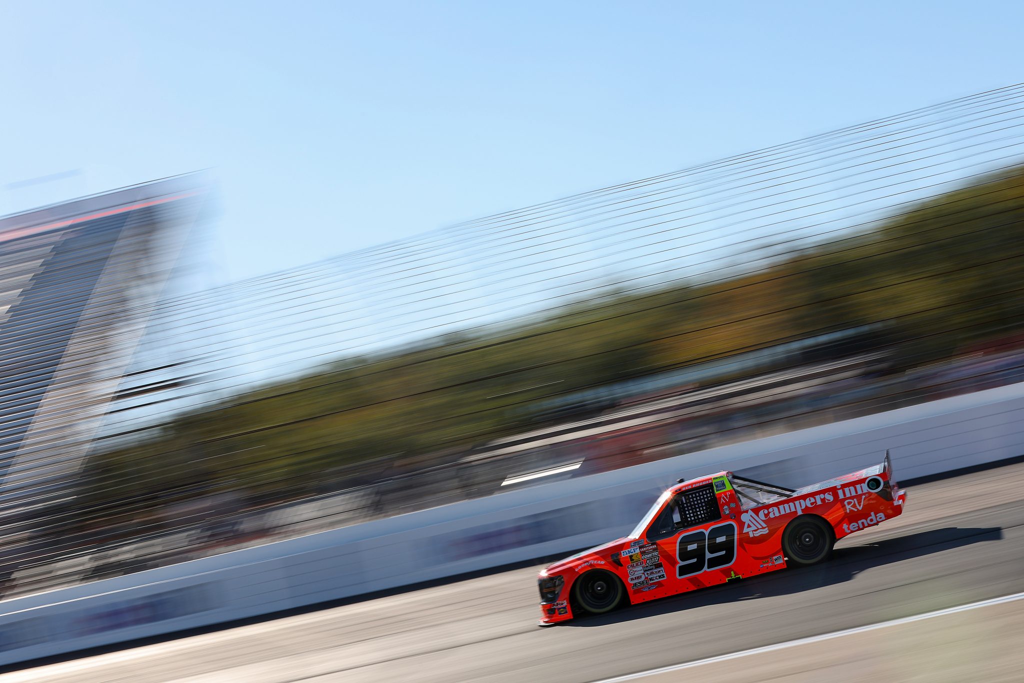 LOUDON, NEW HAMPSHIRE - SEPTEMBER 19: Ben Rhodes, driver of the #99 Campers Inn RV Ford, drives during practice for the NASCAR Craftsman Truck Series Team EJP 175 at New Hampshire Motor Speedway on September 19, 2025 in Loudon, New Hampshire. (Photo by Meg Oliphant/Getty Images) | Getty Images