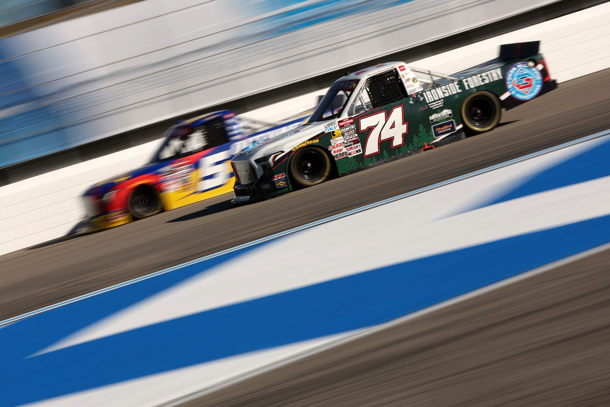 LOUDON, NEW HAMPSHIRE - SEPTEMBER 19: Caleb Costner, driver of the #74 Ironside Forestry Toyota, drives during practice for the NASCAR Craftsman Truck Series Team EJP 175 at New Hampshire Motor Speedway on September 19, 2025 in Loudon, New Hampshire. (Photo by Meg Oliphant/Getty Images) | Getty Images
