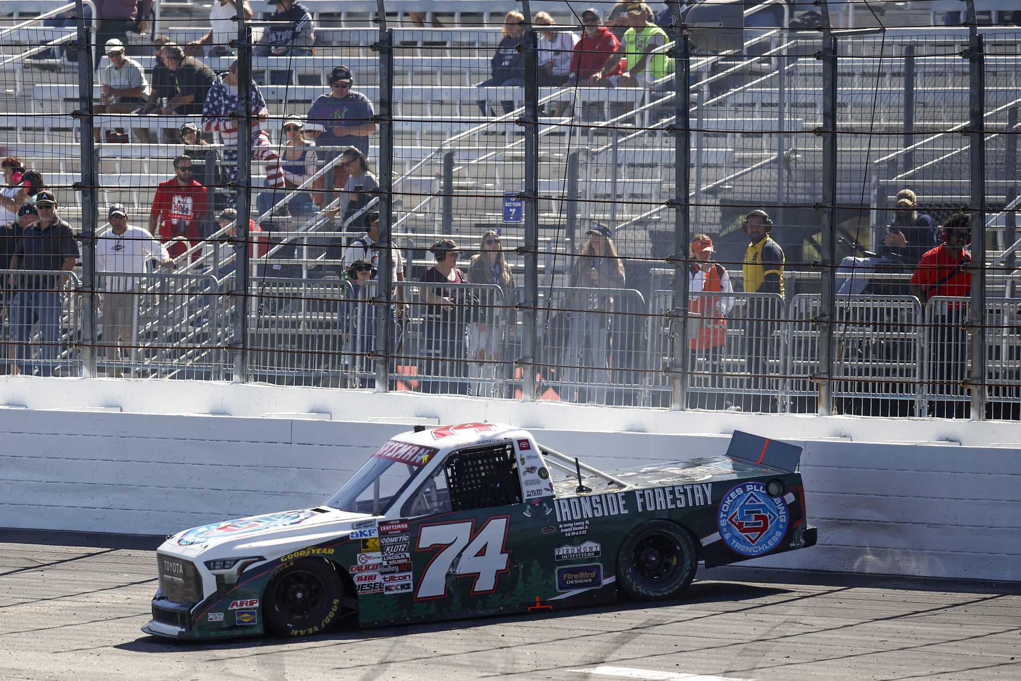 LOUDON, NEW HAMPSHIRE - SEPTEMBER 20: Caleb Costner, driver of the #74 Ironside Forestry Toyota, spins after an on-track incident during the NASCAR Craftsman Truck Series Team EJP 175 at New Hampshire Motor Speedway on September 20, 2025 in Loudon, New Hampshire. (Photo by Sean Gardner/Getty Images) | Getty Images