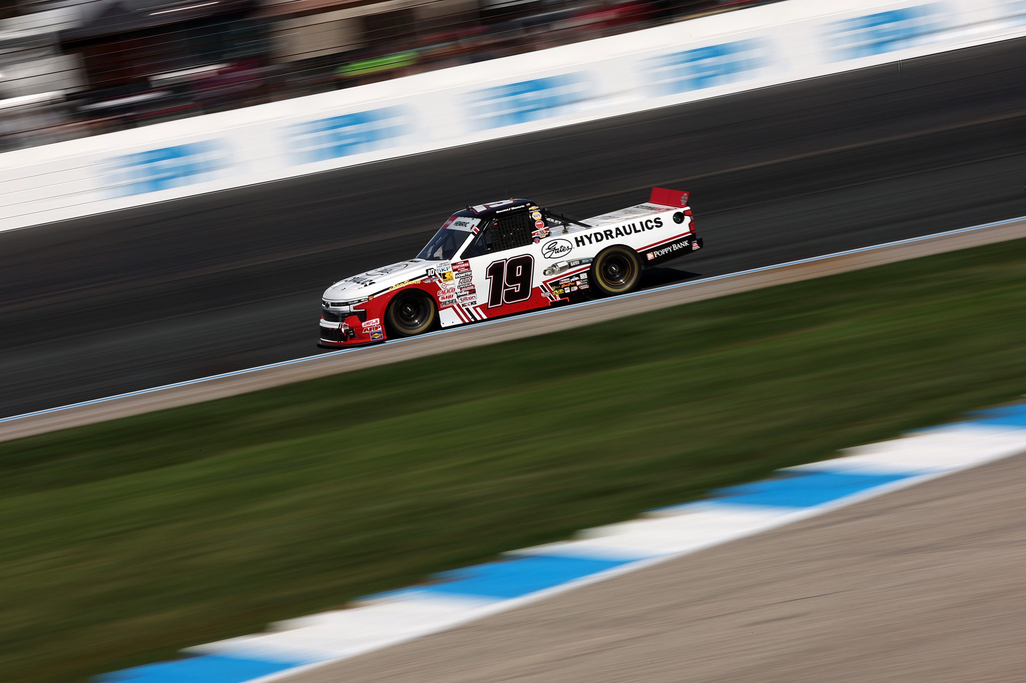 LOUDON, NEW HAMPSHIRE - SEPTEMBER 20: Daniel Hemric, driver of the #19 Gates Hydraulics Chevrolet, drives during the NASCAR Craftsman Truck Series Team EJP 175 at New Hampshire Motor Speedway on September 20, 2025 in Loudon, New Hampshire. (Photo by Meg Oliphant/Getty Images) | Getty Images