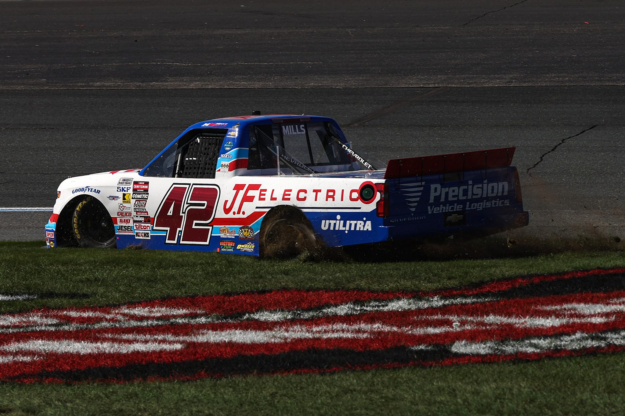 LOUDON, NEW HAMPSHIRE - SEPTEMBER 20: Matt Mills, driver of the #42 J.F. Electric Chevrolet, spins into the grass after an on-track incident during the NASCAR Craftsman Truck Series Team EJP 175 at New Hampshire Motor Speedway on September 20, 2025 in Loudon, New Hampshire. (Photo by Meg Oliphant/Getty Images) | Getty Images