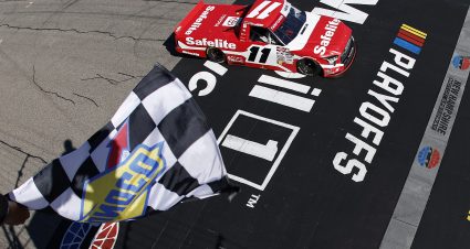 LOUDON, NEW HAMPSHIRE - SEPTEMBER 20: Corey Heim, driver of the #11 Safelite Toyota, takes the checkered flag to win the NASCAR Craftsman Truck Series Team EJP 175 at New Hampshire Motor Speedway on September 20, 2025 in Loudon, New Hampshire. (Photo by Sean Gardner/Getty Images) | Getty Images