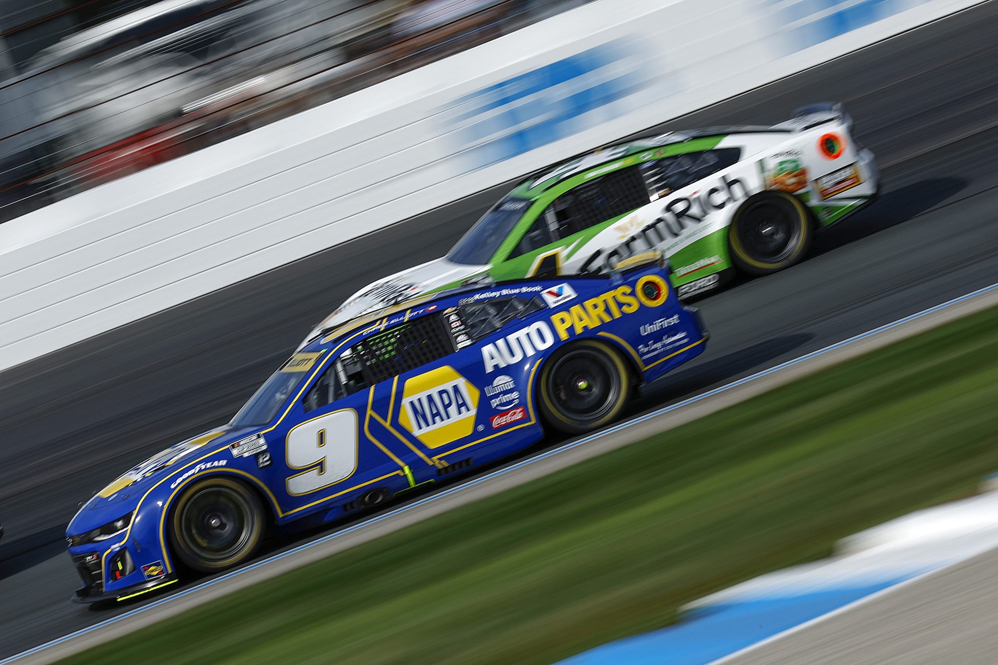 LOUDON, NEW HAMPSHIRE - SEPTEMBER 21: Chase Elliott, driver of the #9 NAPA Auto Parts Chevrolet, and Noah Gragson, driver of the #4 Farm Rich Ford, race during the NASCAR Cup Series Mobil 1 301 at New Hampshire Motor Speedway on September 21, 2025 in Loudon, New Hampshire. (Photo by Sean Gardner/Getty Images) | Getty Images