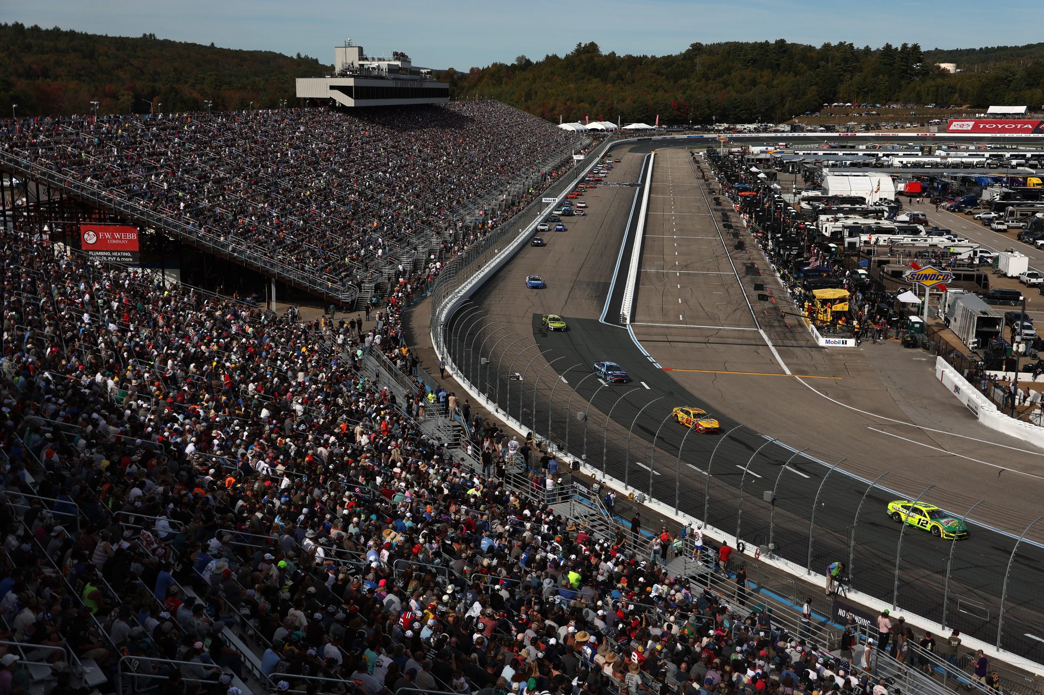 LOUDON, NEW HAMPSHIRE - SEPTEMBER 21: A general view of Ryan Blaney, driver of the #12 Menards/Libman Ford, leading the field during the NASCAR Cup Series Mobil 1 301 at New Hampshire Motor Speedway on September 21, 2025 in Loudon, New Hampshire. (Photo by Meg Oliphant/Getty Images) | Getty Images