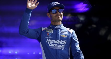 LOUDON, NEW HAMPSHIRE - SEPTEMBER 21: Kyle Larson, driver of the #5 HendrickCars.com Chevrolet, waves to fans as he walks onstage during driver intros prior to the NASCAR Cup Series Mobil 1 301 at New Hampshire Motor Speedway on September 21, 2025 in Loudon, New Hampshire. (Photo by Sean Gardner/Getty Images) | Getty Images