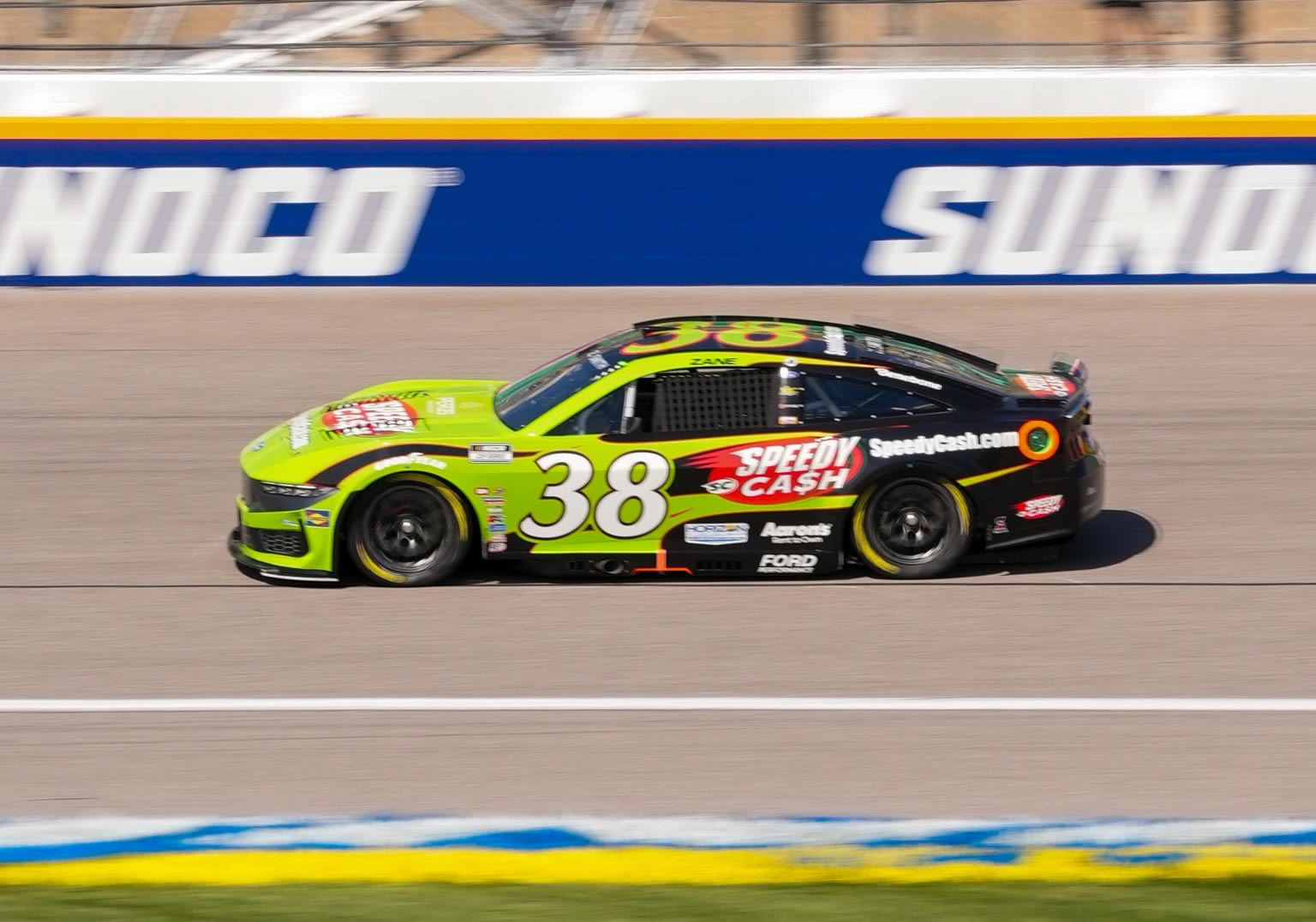 KANSAS CITY, KANSAS - SEPTEMBER 27: Zane Smith, driver of the #38 Speedy Cash Ford, drives during practice for the NASCAR Cup Series Hollywood Casino 400 Presented by ESPN BET at Kansas Speedway on September 27, 2025 in Kansas City, Kansas. (Photo from Front Row Motorsports)