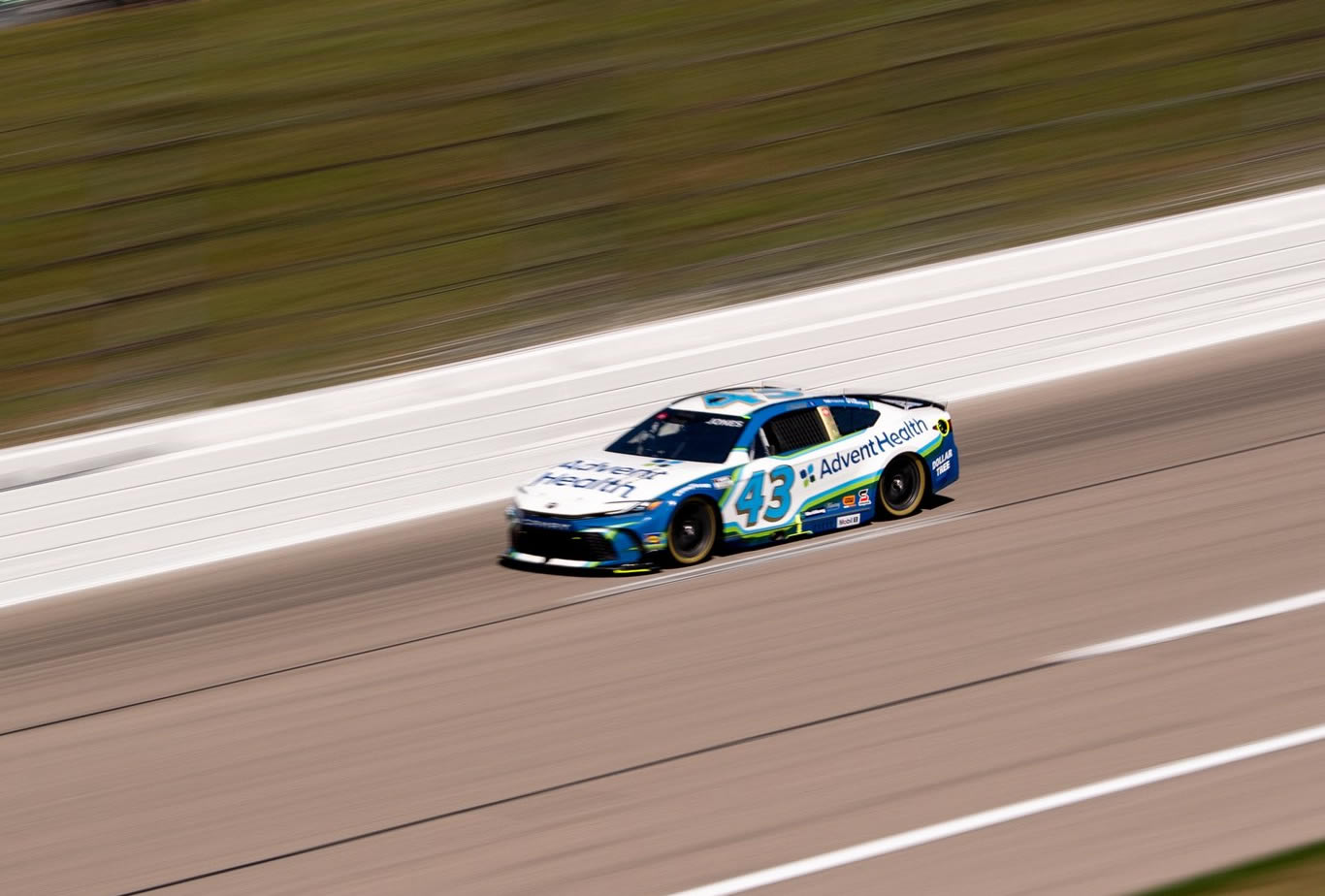 KANSAS CITY, KANSAS - SEPTEMBER 27: Erik Jones, driver of the #43 AdventHealth Toyota, drives during practice for the NASCAR Cup Series Hollywood Casino 400 Presented by ESPN BET at Kansas Speedway on September 27, 2025 in Kansas City, Kansas. (Photo from Legacy Motor Club)