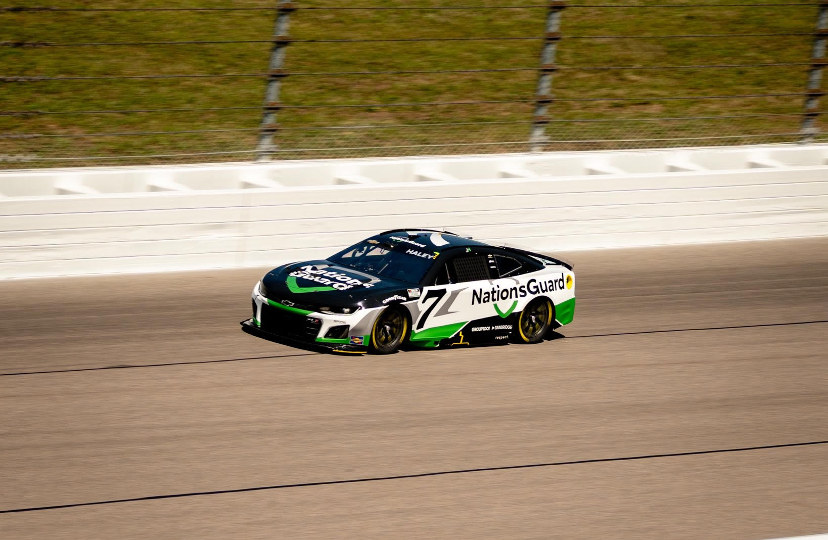 KANSAS CITY, KANSAS - SEPTEMBER 27: Justin Haley, driver of the #7 NationsGuard Chevrolet, drives during practice for the NASCAR Cup Series Hollywood Casino 400 Presented by ESPN BET at Kansas Speedway on September 27, 2025 in Kansas City, Kansas. (Photo from Spire Motorsports)