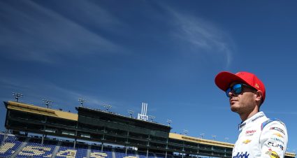 KANSAS CITY, KANSAS - SEPTEMBER 27: Kyle Larson, driver of the #5 HendrickCars.com Chevrolet, walks the grid during practice for the NASCAR Cup Series Hollywood Casino 400 Presented by ESPN BET at Kansas Speedway on September 27, 2025 in Kansas City, Kansas. (Photo by Chris Graythen/Getty Images) | Getty Images